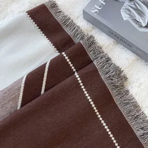 Warm winter reversible tassel scarf shawl in brown and off-white colorblock design.