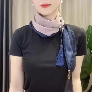 Stylish dual-color neck scarf with tassel and leaf pendant, elegant daily accessory for women.