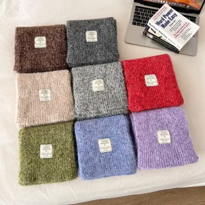 Cozy winter solid color wool knitted scarf for men and women, soft and warm neck guard.