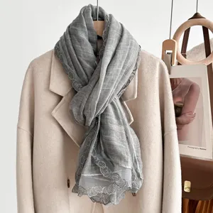 Grey lace trim scarf winter soft elegant neck warmer detailed close up stylish apparel accessory