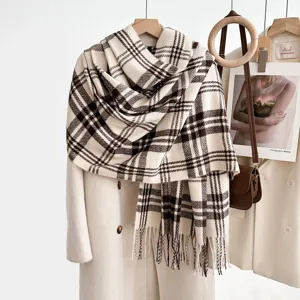 Cozy brown and white plaid winter scarf with fringe detail, elegant warm shawl for women.