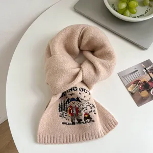 Cozy beige knit winter scarf featuring cute camping bear embroidery for warm stylish daily wear.