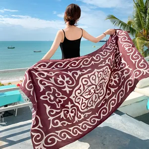 Ethnic style beach scarf and sun protection shawl for women, perfect for holiday resort photography.