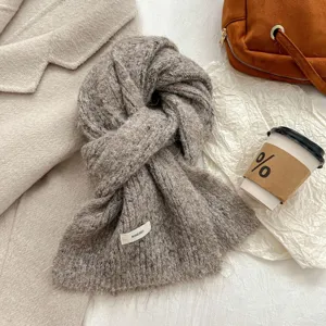 Cozy mohair knit scarf for women, warm winter fashion neck warmer in stylish grey brown color.