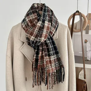 Cozy winter plaid tassel scarf in brown and black, soft stylish neck wrap for cold weather.