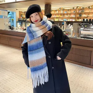 Detailed view of cozy colorblock striped mohair scarf, soft warm winter neck accessory.