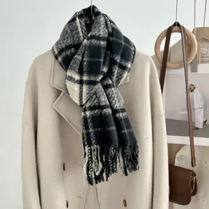Black and grey plaid loop yarn scarf with fringe, thick cozy winter accessory for women.