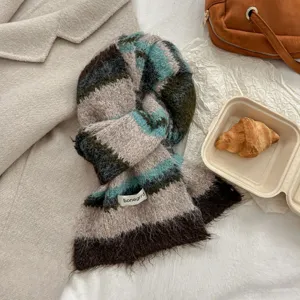 Detailed view of the women's wool-blend striped cozy scarf, soft fluffy winter neck warmer.