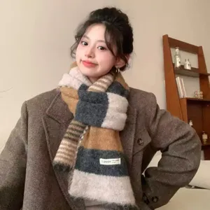 Cozy colorblocked knit winter scarf for women, soft striped design for warm daily casual wear.