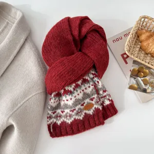 Cozy winter knit scarf with retro Fair Isle pattern and elegant red design details.