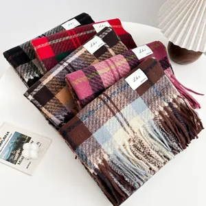 Cozy plaid blanket scarf for women, soft imitation cashmere shawl with fringe and classic design.