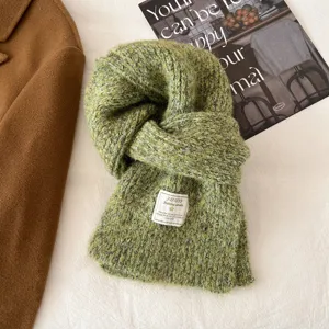 Cozy wool-blend winter knitted scarf in solid green color, soft and warm unisex accessory.