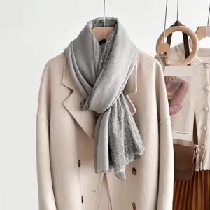 Grey lace trim scarf detail showing soft fabric texture and elegant drape for daily wear.