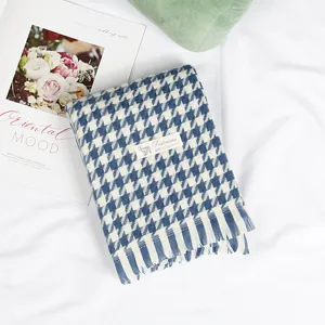 Classic blue and white houndstooth scarf with cozy tassels, elegant autumn winter shawl.