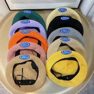 Colorful knitted berets detailed view showcasing various colors and stylish autumn winter design.