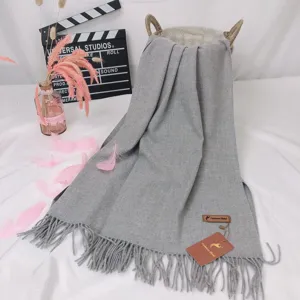 Cozy grey cashmere blend scarf with elegant fringes, soft winter warm shawl for women daily wear.