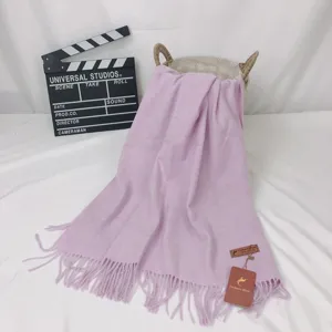 Solid color imitation cashmere winter warm scarf with elegant fringe detail for women.