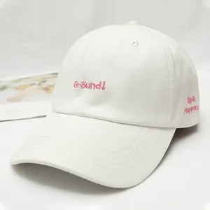White embroidered baseball cap with pink graphic text, stylish casual sun hat for daily wear.