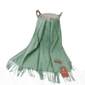 Solid green cashmere blend scarf with elegant tassels, warm winter shawl for women.