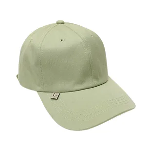 Casual light green baseball cap with cute smile metal tag, Korean style curved brim sun hat.