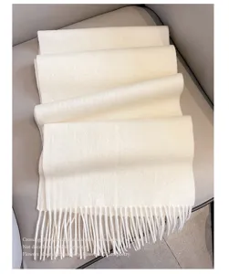 Minimalist solid color long thick wool winter scarf shawl with tassels, soft warm neckerchief.