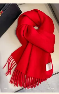 Winter solid red wool scarf detail shot, thick warm cashmere-feel tassel shawl for women.