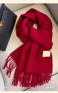 Red wool scarf detail, winter cozy cashmere feel fringe shawl accessory display