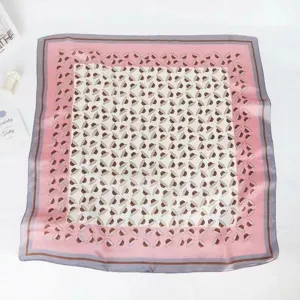 Chic pink square silk scarf with stylish hat print, perfect elegant neckerchief for daily wear.