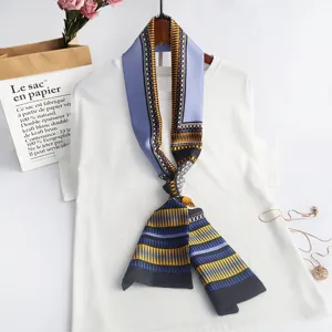 Narrow long silk scarf, chic geometric print neckerchief, stylish spring fashion accessory.