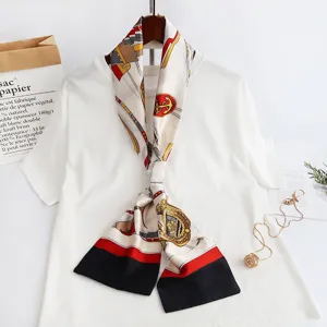Chic skinny silk scarf with vintage chain crest print, elegant accessory for women.