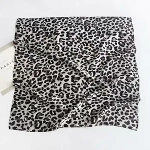 Elegant black and white leopard print silk scarf detail view, 70x70cm fashion neckerchief