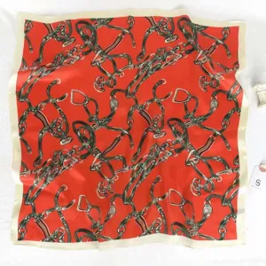 Elegant orange square silk scarf featuring classic equestrian belt and buckle print design.