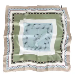 Elegant geometric print silk square scarf, premium lightweight accessory for women.