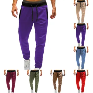 Men's casual solid color straight trousers with contrast waistband and drawstring for daily wear.
