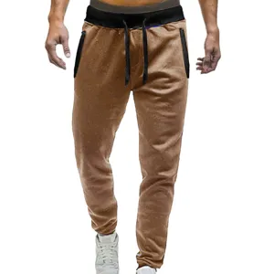 Men casual sweatpants with elastic drawstring waist and zipper pockets for daily wear.