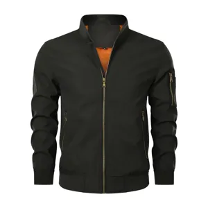 Detail view of mens casual stand collar bomber jacket, black zip up outerwear with orange lining.