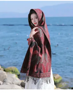 Ethnic fringe shawl detail view, boho patterned winter warm cape cloak for women.