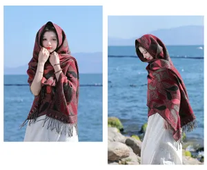 Ethnic style hooded cape detail shot, showing the retro bohemian pattern and tassel design clearly.