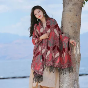 Bohemian ethnic style thick warm tassel shawl cloak for women, outdoor winter fashion wear.