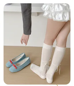Sweet milky white floral long socks for women featuring cute back ribbon bow design.