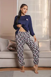 Cozy floral pajama set detail, long sleeve top and printed pants for relaxing daily home wear.