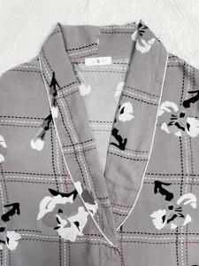 Grey floral plaid pajama top detail view showing stylish lapel and collar with size S label