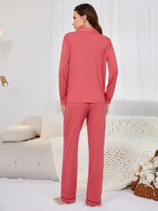 Women long sleeve pajama set back view, coral pink casual sleepwear loungewear setup.