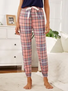 Pantaloni da donna a quadri rosa con coulisse e polsini, comodi pantaloni da notte.