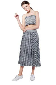 Detailed view of black and white gingham two-piece set featuring stylish crop top and skirt.