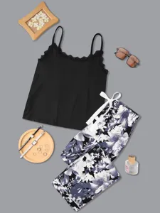 Set pigiama da donna con canotta in pizzo e pantaloni floreali lunghi, comodo abbigliamento.