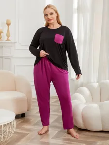 Plus-size long sleeve sleepwear set detail view, cozy black and magenta loungewear.