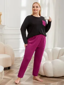 Detail view of the comfortable plus-size long sleeve loungewear set in cozy home scene setting.