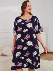 Detail view of plus size floral print short sleeve nightdress, comfortable home wear for women.
