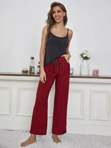 Sexy women camisole pajama set featuring a black sleeveless top and red plaid pants for summer.